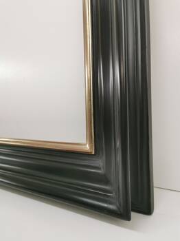 Finish detail: hand-painted satin black and a moon-gold gilded edge