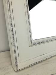 Mirror in white frame