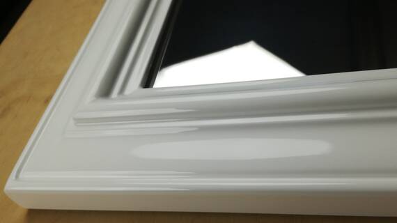 Mirror in whte frame