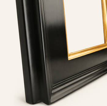 Casina 10 lower-corner detail — 23-karat gold leaf over red bole, stepped cyma of the black frieze, hand-patinated finish