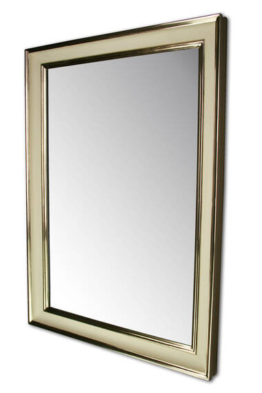 Mirror in cream frame gilded with gold leaf