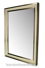 Mirror in cream frame gilded with gold leaf