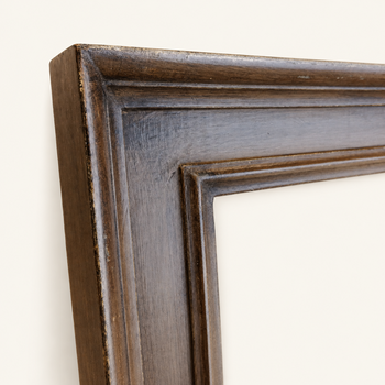 Brown picture frame — corner detail with visible rabbet and hand-applied patination on the moulding
