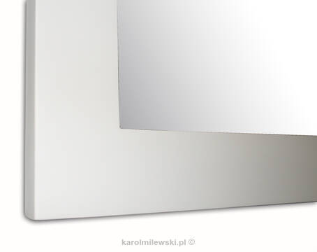 Mirror in white frame.