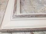 White distressed picture frame.