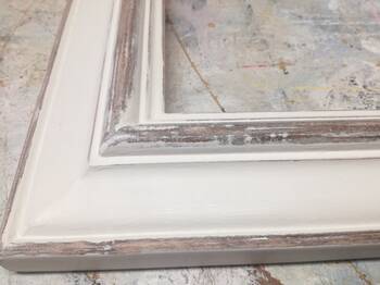 White distressed picture frame.
