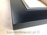 Mirror in black frame, partially gilded white gold leaf