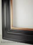 Detail of corner join on handcrafted gold picture frame showing perfect alignment.