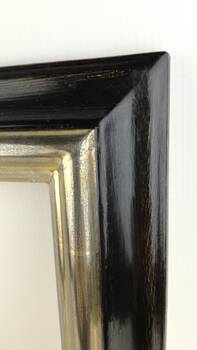 Close-up of the Argentia Frame's Silver Leaf Finish – A detailed view of the genuine silver leaf applied over a grey bole, showcasing the refined texture and subtle patina.