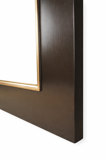 Corner of the brown frame — wooden spline joint; rubbed-through gilding with the red bole showing through at the inner lip