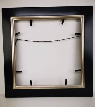 Black picture frame, partially gilded white gold leaf over red bole.