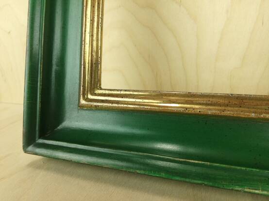 Mirror in  gold gilded green frame