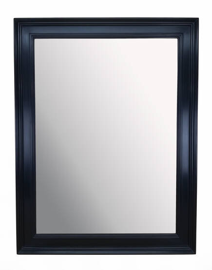 Mirror in black frame.
