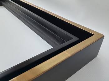 Fine detail of gold gilding and smooth satin finish