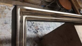 Custom picture frame gilded with moon gold on blue bole