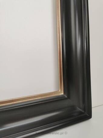 Black picture frame with gilded lip 22 carat gold leaf.