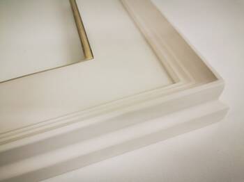Angled view of the Casina 12 frame corner highlighting precise workmanship and subtle gold detailing.
