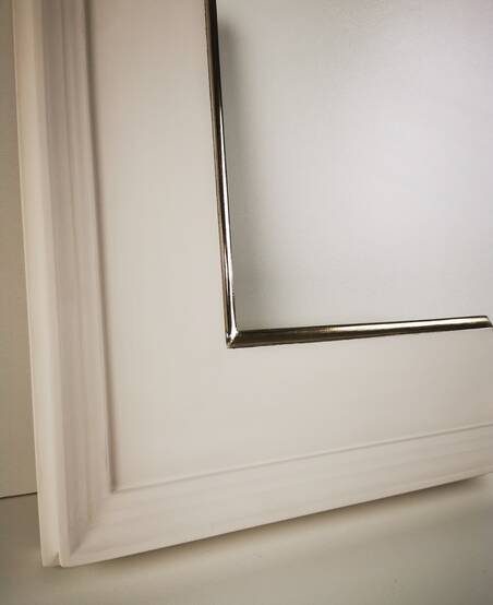 White matt picture frame with gilded 22ct gold leaf over gray bole, lip. 