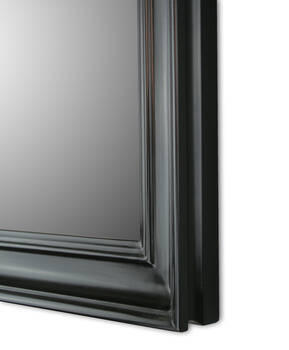 Side of the mirror frame in the same uniform deep black tone as the front, showing the 38 mm depth of the moulding