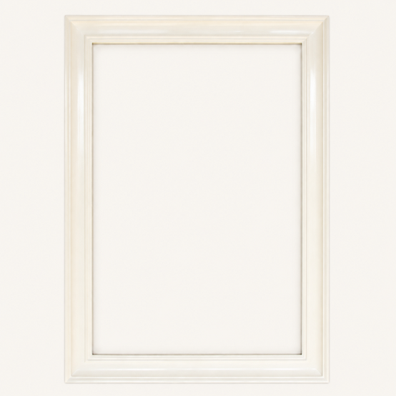Chalky white picture frame — corner close-up showing the quarter-round outer edge and the concave hollow of the profile, warm satin off-white