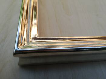 Custom picture frame gilded with white gold