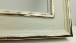 Mirror in a Toskania 78 frame — 22-karat moon gold leaf, light grey panel